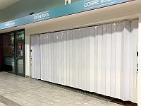Protector sliding folding security shutter to the Coffee Rooms at Bristol bus station