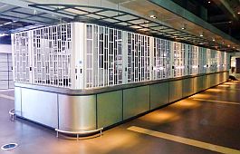 FlexiGlide sliding folding shutter going around a bar island