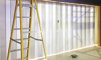 a white solid curtain sliding shutter